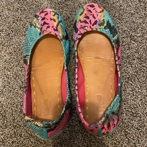 Gently used pair of tieks in electric snake in a size 10